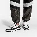 louis-vuitton-lv-trainer-sneaker--AQ9U2ADN02_PM1_Cropped worn view.webp